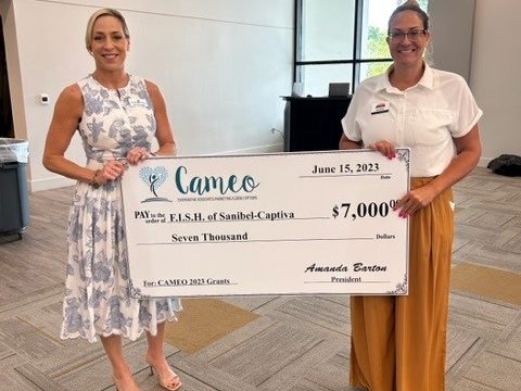 CAMEO - big check Amy & Erica1