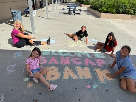 YMCA Financial Literacy - welcome back sancap bank chalk art kids coloring & laura